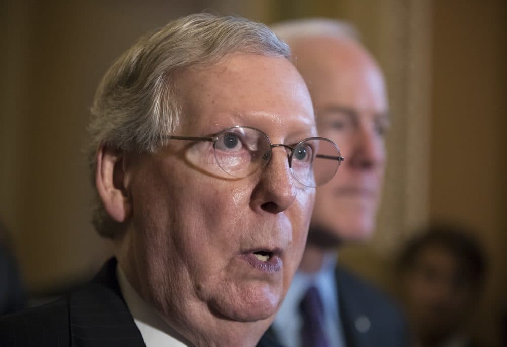 In this July 11, 2017, photo, Senate Majority Leader Mitch McConnell of Ky., joined by Majority Whip John Cornyn of Texas, meets with reporters after a closed-door Republican strategy session on Capitol Hill in Washington. (J. Scott Applewhite/AP)