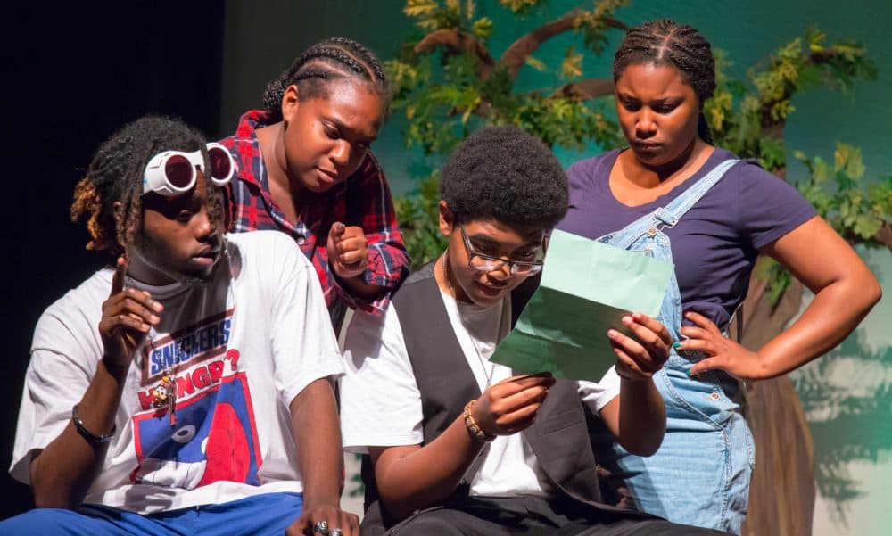 Codman students -- Jayrelle Fairweather as Andrew Aguecheek, Jordyn Davis as Fabian, Tre'Jon Carrasquillo as Toby Belch and Antoinette Webster as Maria -- play a scene from "Twelfth Night." (Courtesy Huntington Theatre Company)