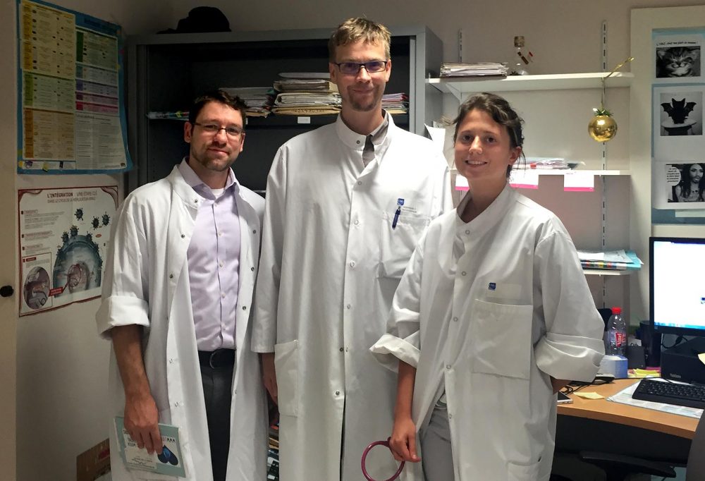 Dr. David Scales, left, with Lyme disease clinic staff Dr. Francois Goehringer, center, and Dr. Marie Geisler. (Courtesy)