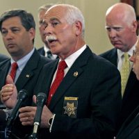 Bristol County Sheriff Thomas Hodgson gestures during a news conference at the State House in Boston in 2011. (Charles Krupa/AP)
