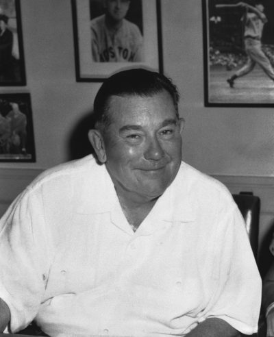 Tom Yawkey, at the time the owner of the Boston Red Sox, sits in his Fenway Park office in Boston in August 1955. (Frank C. Curtin/AP)