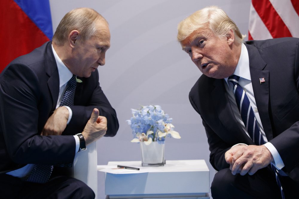 In this July 7 file photo, President Trump meets with Russian President Vladimir Putin at the G-20 Summit in Hamburg. On Aug. 2, Trump signed a bill he called "seriously flawed" that imposes new sanctions on Russia. (Evan Vucci/AP)