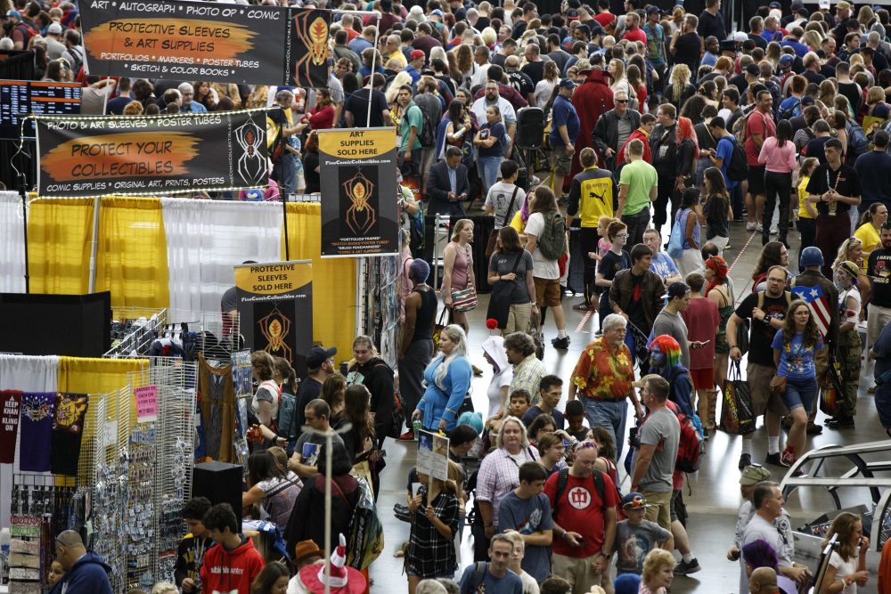 Fans crowd the display floor on Friday. (Michael Dwyer/AP)