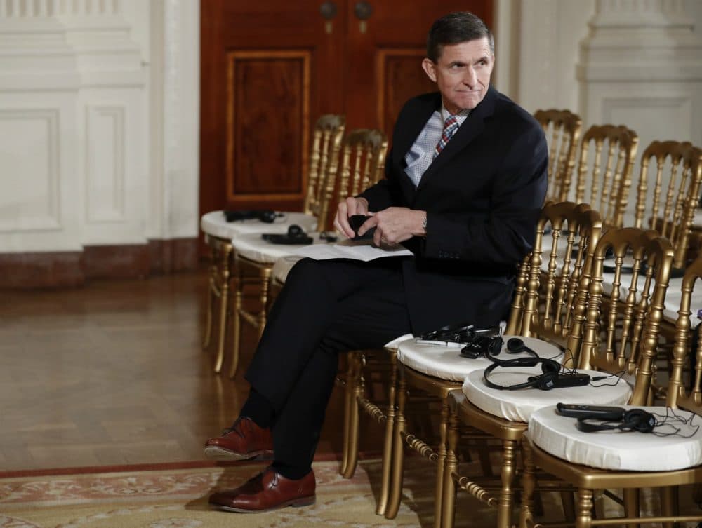 Michael Flynn, Trump's former national security adviser, sits in the front row before the start of a joint news conference with the president and Japanese Prime Minister Shinzo Abe in the East Room of the White House, in Washington, Feb. 10, 2017. (Carolyn Kaster/AP)