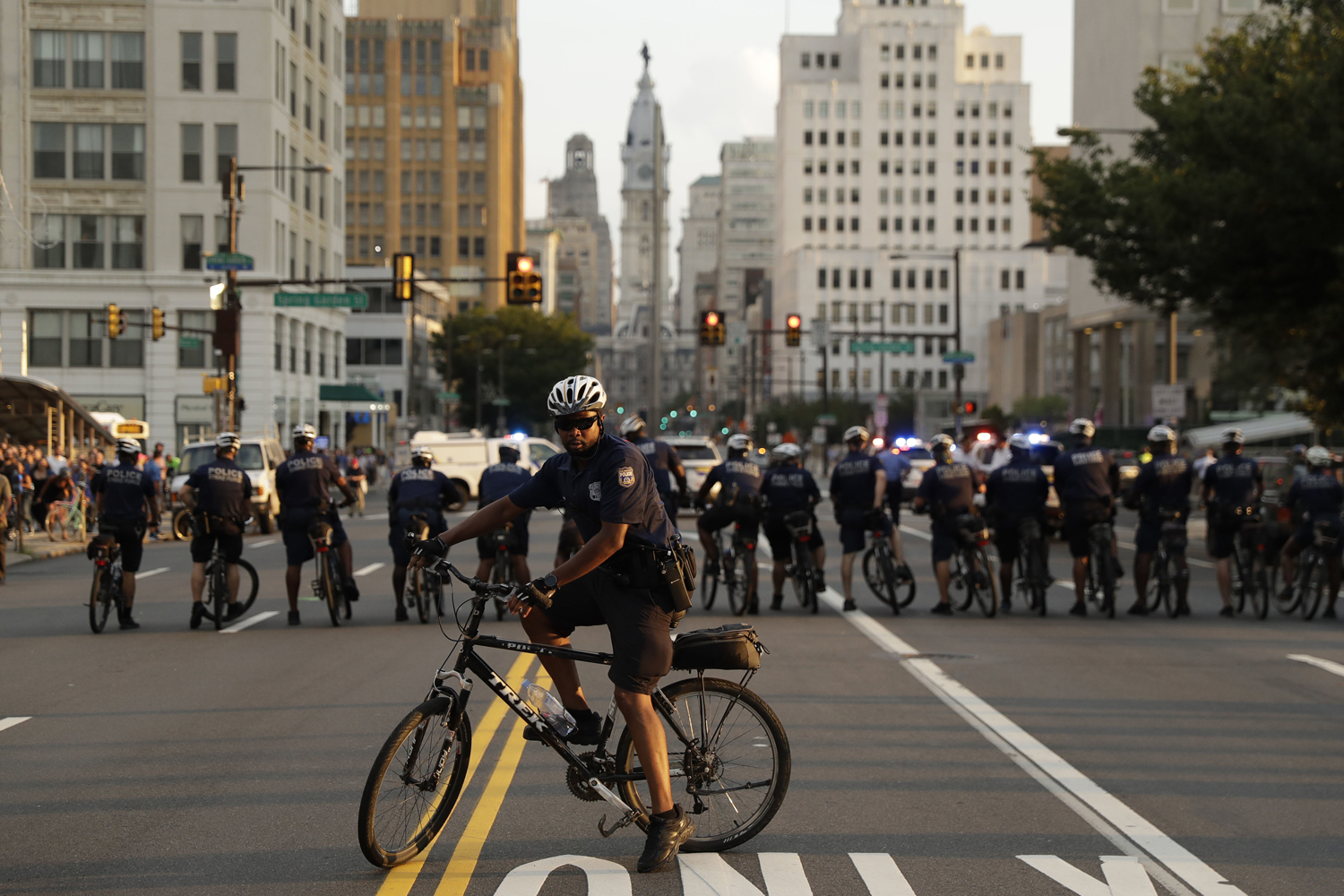 Police officers form a line ahead of protesters as the march in response to a white nationalist rally held in Charlottesville, Va., over the weekend, in Philadelphia, Wednesday, Aug. 16, 2017. (Matt Slocum/AP)
