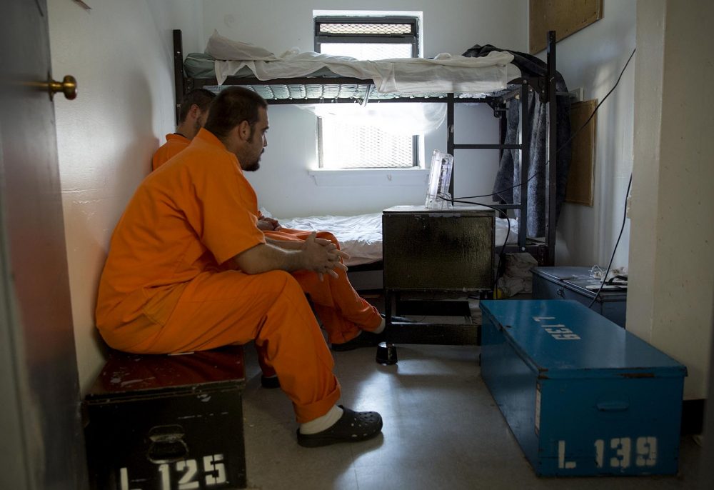 The men stay for 30 to 90 days in small rooms, which are former cells with metal mesh on the widows, bunk beds and wooden foot locker like benches. (Robin Lubbock/WBUR)