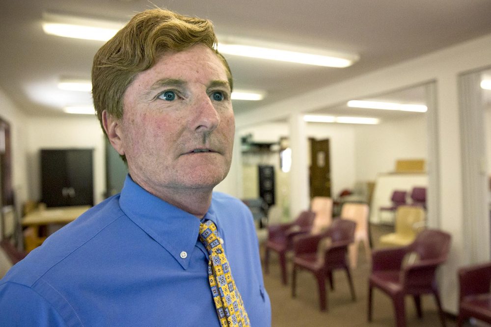 Tom Neville, superintendent of MASAC at Plymouth, in the Pondside Meeting House, where programming for patients takes place (Robin Lubbock/WBUR)