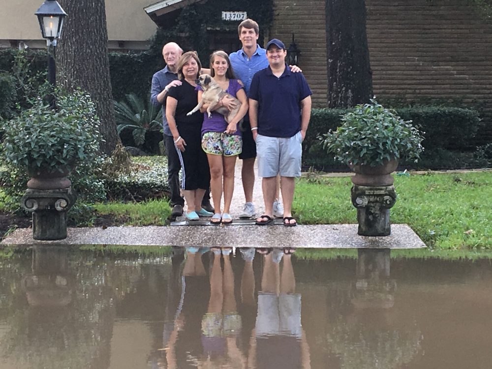 The Fallick family in front of their home. From left to right: Ed and Leticia Fallick, Carla Fallick and Zack Wilson (who were married two days ago) and Federico Fallick. (Anthony Brooks/WBUR)
