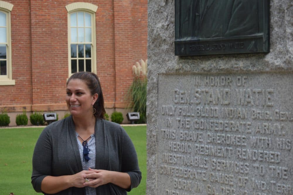Cherokee Nation historian Catherine Gray discusses the Stand Watie monument at the Cherokee Nation Courthouse in Tahlequah, Okla. (Jacob McCleland/KGOU)