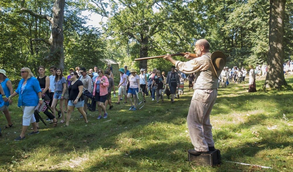 Cast members perform as the audience walks around the grounds of The Old Manse. (Andrea Shea/WBUR)