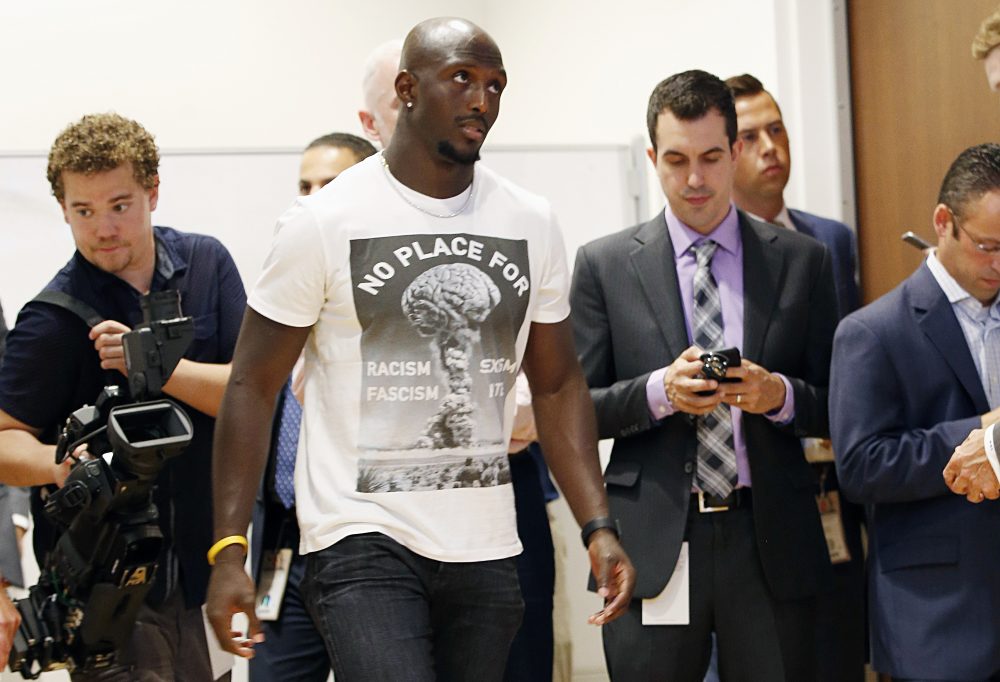Patriots safety Devin McCourty walks to the podium to speak with the media following his team's win. (Michael Dwyer/AP)