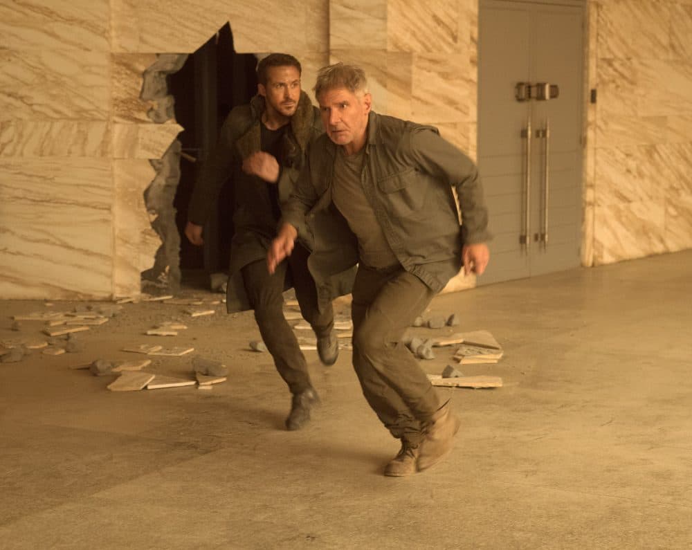 Ryan Gosling as K and Harrison Ford as Rick Deckard in "Blade Runner 2049." (Courtesy Stephen Vaughan/Alcon Entertainment)