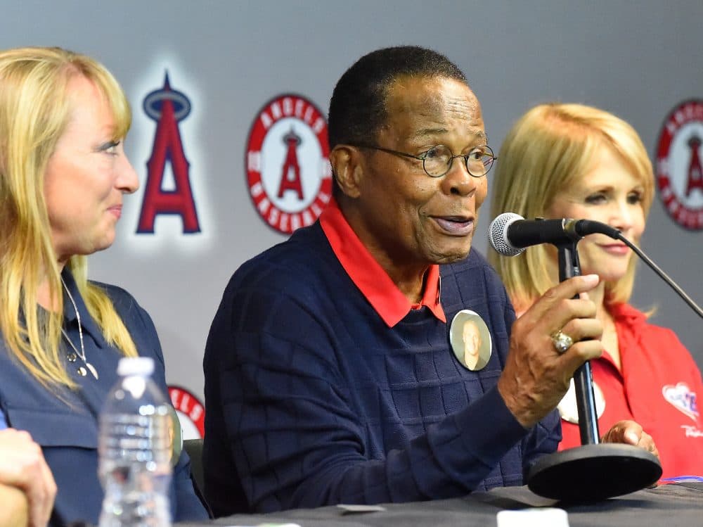 Carew speaks during a press conference prior to a game between the Los Angeles Angels and the Oakland Athletics on April 25, 2017 in Anaheim, Calif. Mary Reuland is to his left, and Rhonda is to his right. (Jayne Kamin-Oncea/Getty Images)