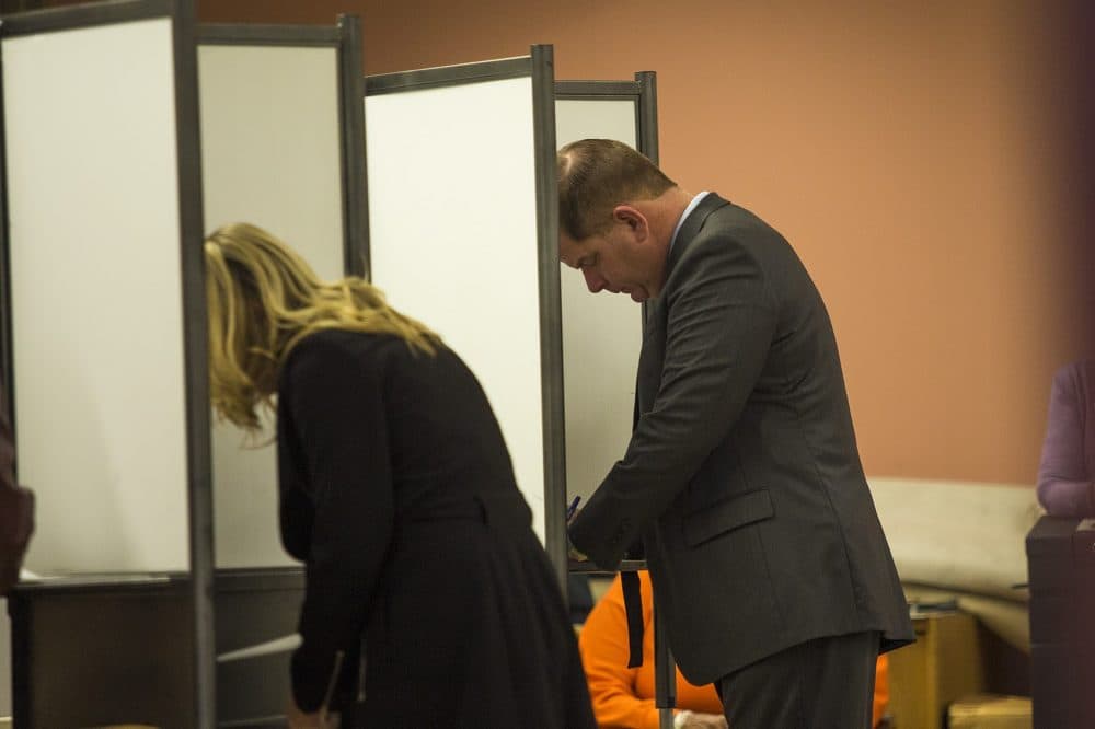 Walsh votes at the Lower Mills Branch of the Boston Public Library. (Jesse Costa/WBUR)
