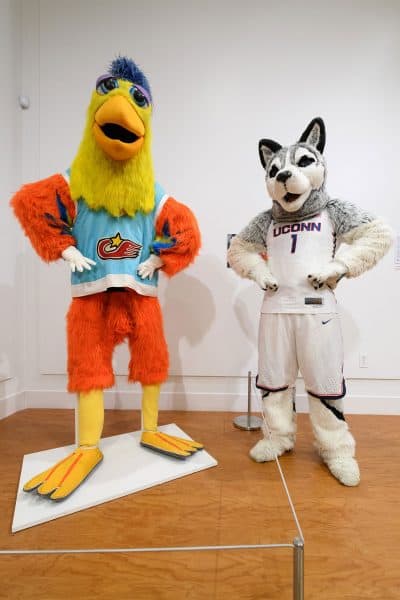 The Famous San Diego Chicken (left), built in 1979 and performed by Ted Giannoulas, and Jonathan the Husky from the University of Connecticut. Bell says Giannoulas "invented the modern comic, improvising, dancing mascot who is goofy and interacts with the team and officials and the audience.” (Courtesy Ballard Institute and Museum)