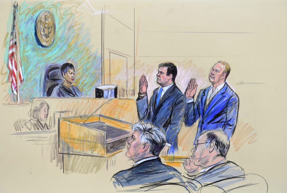 A court artist drawing shows President Donald Trump's former campaign chairman, Paul Manafort, center standing and Manafort's business associate, Rick Gates, in federal court in Washington, Monday, Oct. 30, 2017, before U.S. Magistrate Judge Deborah A. Robinson. (Dana Verkouteren/AP)