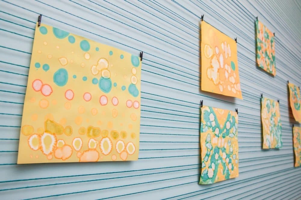 The artwork of museum visitors hangs in the ICA lobby as part of Rydz's art project. (Courtesy Galya Feierman/ICA)