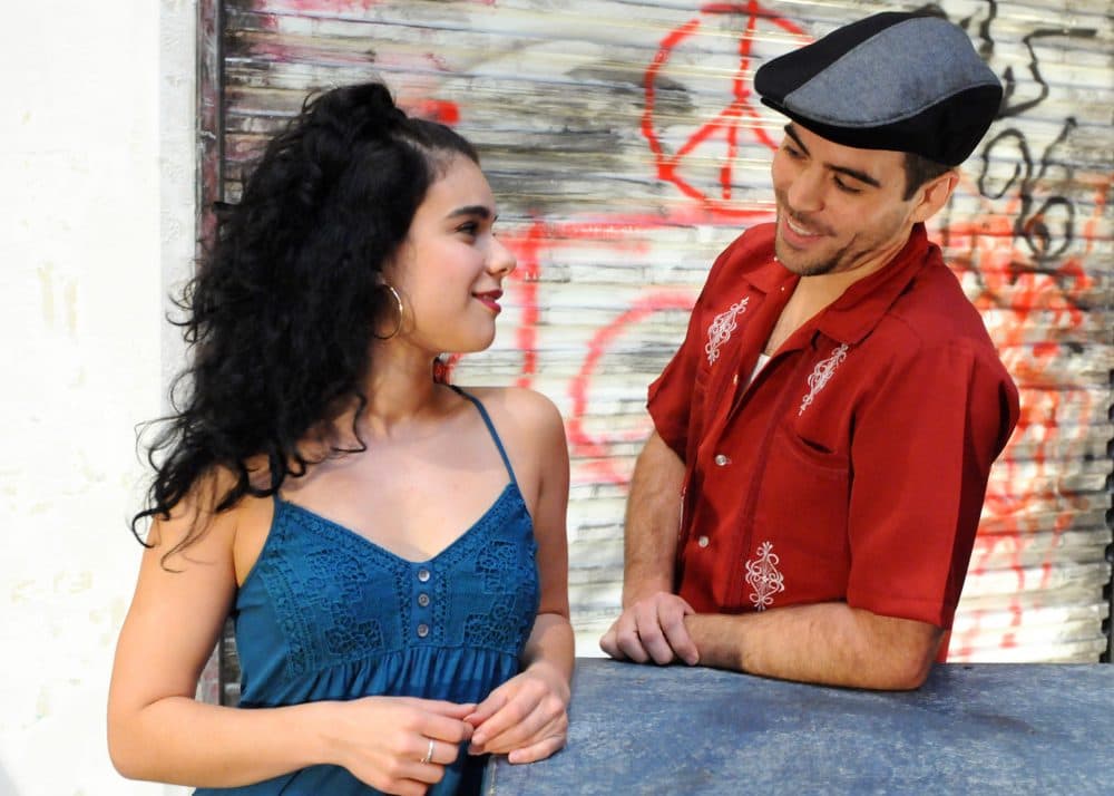 Iliana Garcia as Vanessa and Diego Klock-Perez as Usnavi in Wheelock Family Theatre's production of "In The Heights." (Courtesy Randy H. Goodman)