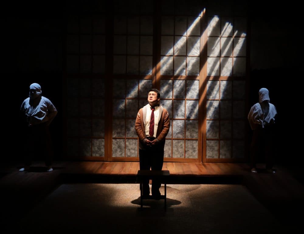 Michael Hisamoto as Gordon Hirabayashi with Gary Thomas Ng and Samantha Richert as kurogos in "Hold These Truths." (Courtesy Mark S. Howard)