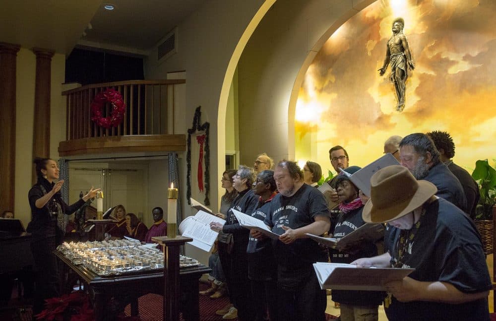 The MANNA Singers sing at the memorial service, at the Church On The Hill in Boston. (Robin Lubbock/WBUR)