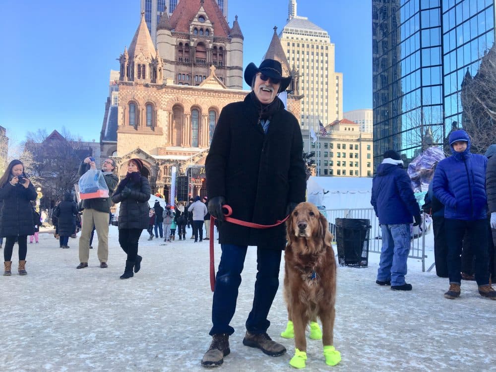 Ready for First Night, Bill Lehrman came from Old Lyme, Conn., with his dog Bear. His New Year’s resolution? Spend more time in the woods with Bear. (Simon Rios/WBUR)