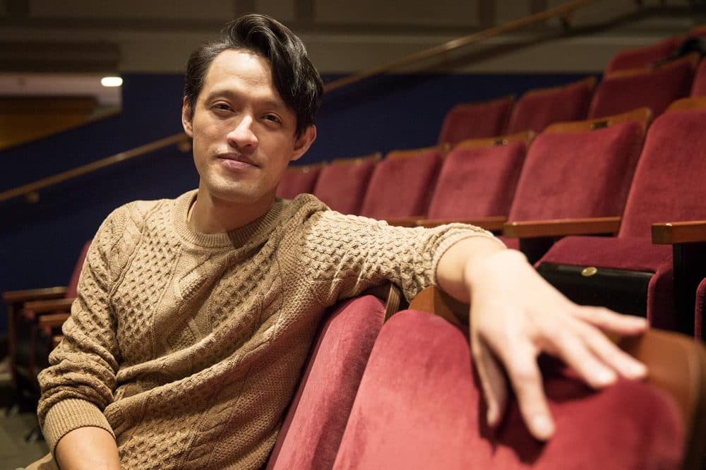 Vichet Chum at the Merrimack Repertory Theatre, where he's performing in his stage memoir "Knyum." (Robin Lubbock/WBUR)