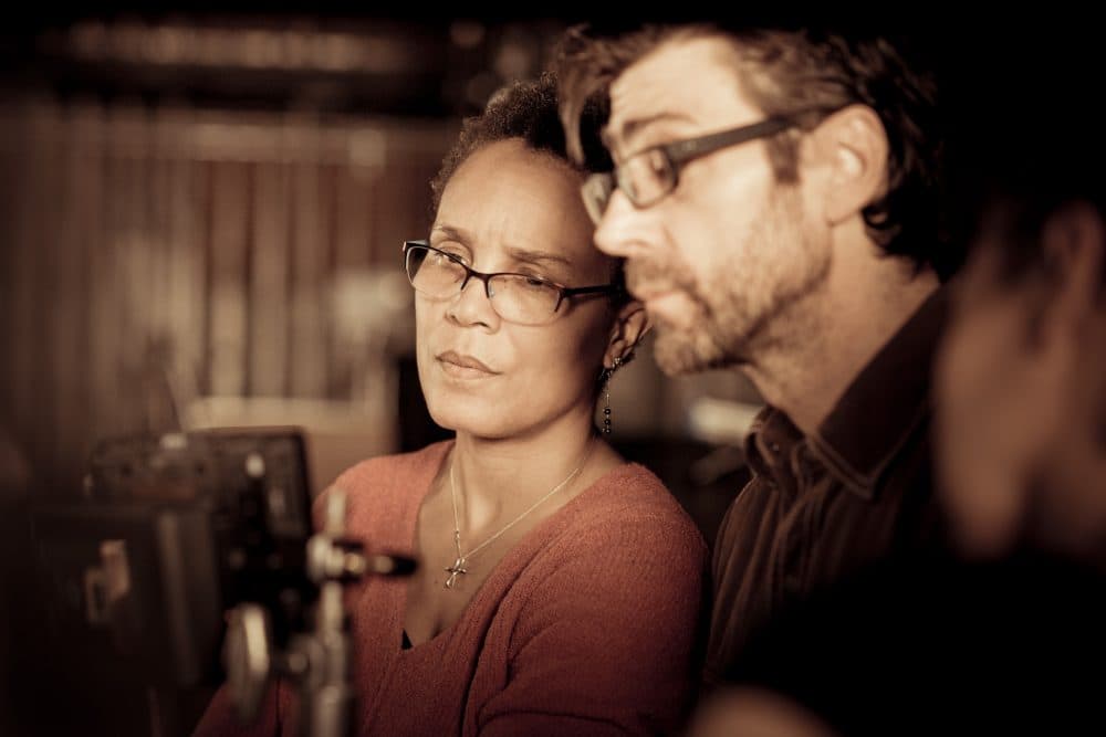 Director and producer Tracy Heather Strain and producer and editor Randall MacLowry during reenactment filming for "Sighted Eyes/Feeling Heart" at the Strand Theatre in Boston in January 2017. (Courtesy Eric Levin)