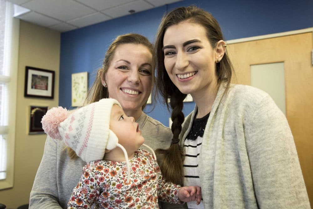 Caitlin Gillespie with her daughter Harper Rose and Palaver's Elizabeth Moore. (Robin Lubbock/WBUR)