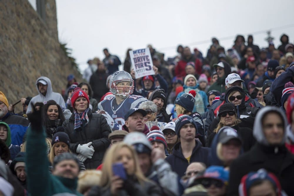 Fans gather outside of Gillette Stadium to send off the Patriots to the Super Bowl. (Jesse Costa/WBUR)