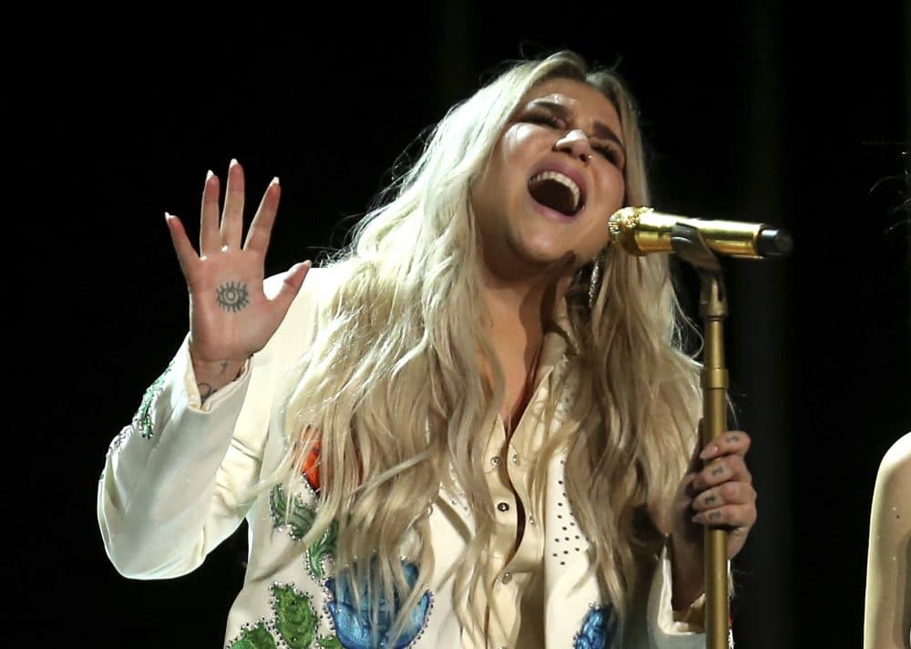 Kesha performs "Praying" at the 60th annual Grammy Awards at Madison Square Garden on Sunday, Jan. 28, 2018, in New York. (Matt Sayles/Invision/AP)
