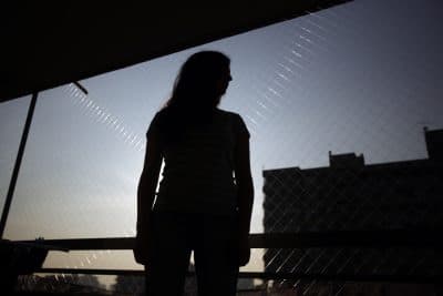 In this 2015 file photo, a 25-year-old Latin American woman (who did not want to be identified), who used misoprostol to terminate an unplanned pregnancy in January, poses for a photo. (Luis Hidalgo/AP)