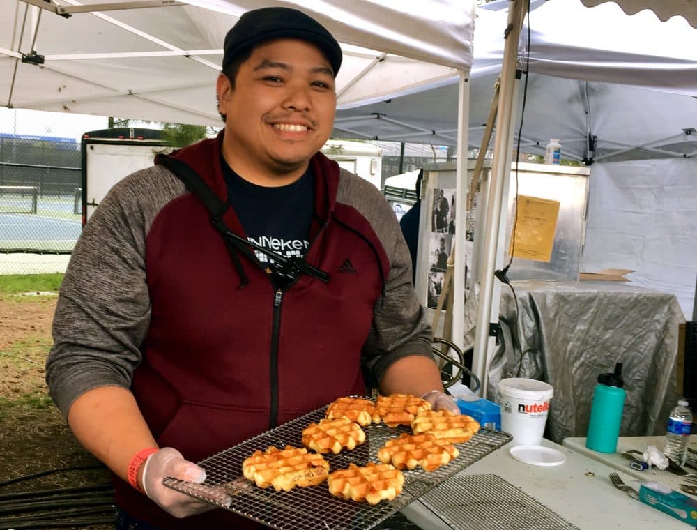 Zinneken's Waffles co-owner Phil Pham at Boston Calling. (Andrea Shea/WBUR)