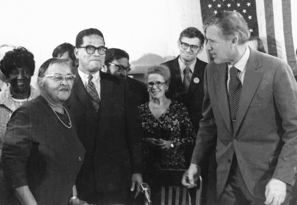Melnea Cass, front far left, next to Bob Coard and with Francis Sargent, front far right, at a bill-signing in South Boston. (Courtesy of ABCD)