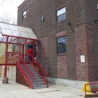 A resident walks into the Casa Esperanza’s men’s program in Roxbury. (Jesse Costa/WBUR)