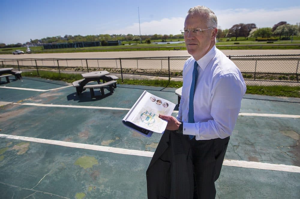 Tom O'Brien, founder and managing director of the Boston-based HYM Investment Group, speaks at Suffolk Downs. (Jesse Costa/WBUR)