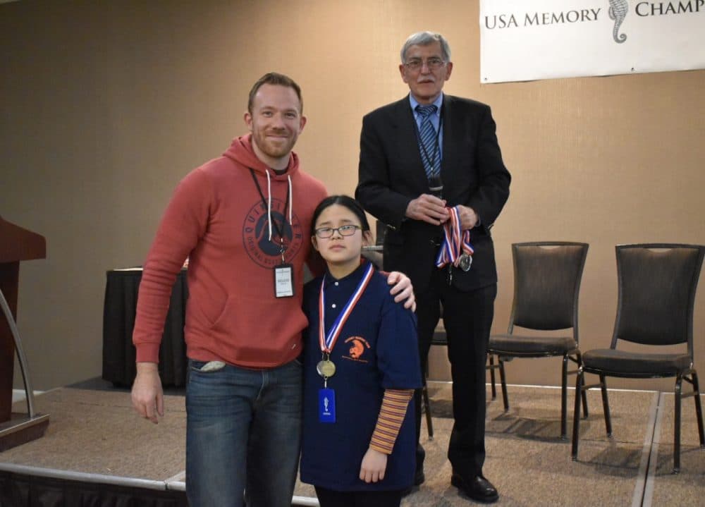 Repeat memory champ Nelson Dellis, new record-breaker Xuanxi Yang of Hershey Middle School, and USA Memory Championship founder Tony Dottino (Courtesy of USA Memory Championship)