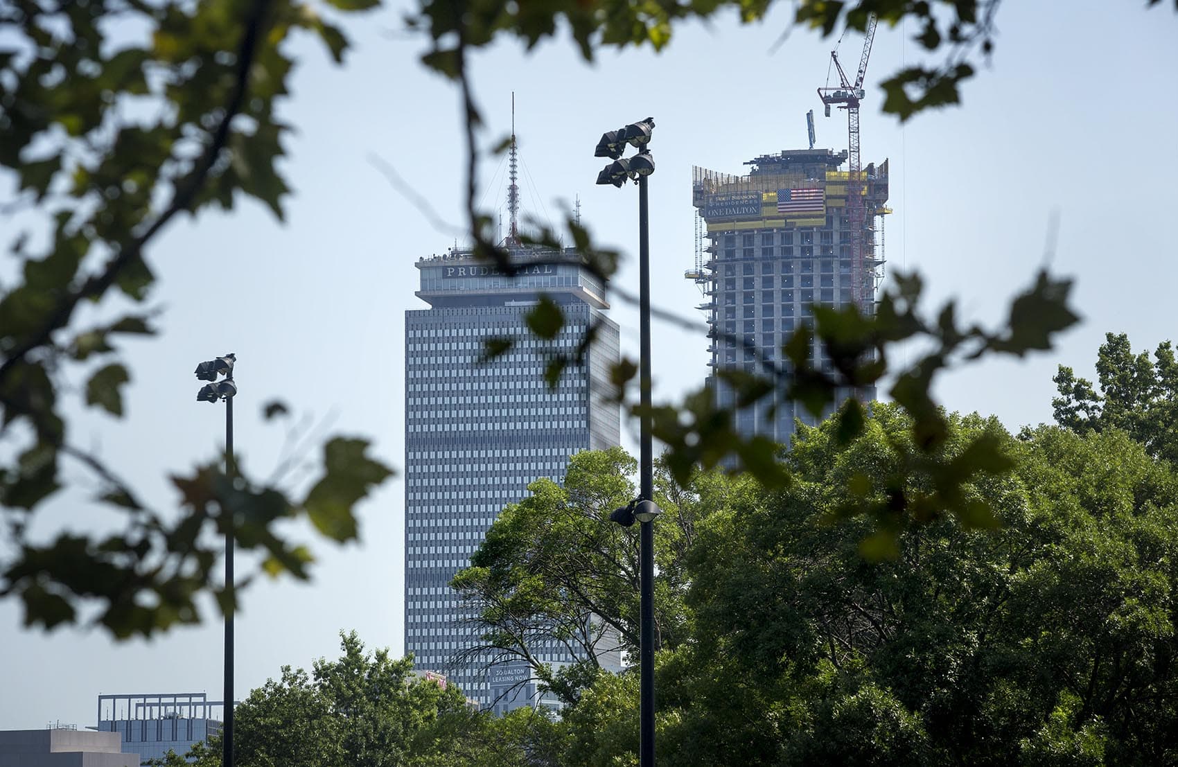 The Prudential Building, left, and One Dalton Street, seen from the Fenway (Robin Lubbock/WBUR)
