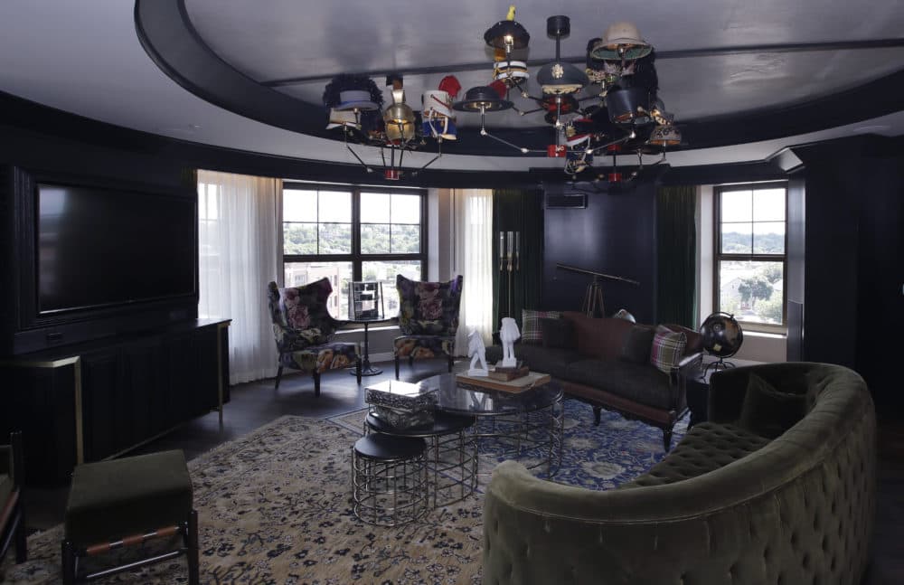 A chandelier featuring hats in tribute to Dr. Seuss characters hangs in the Presidential Suite. (Charles Krupa/AP)