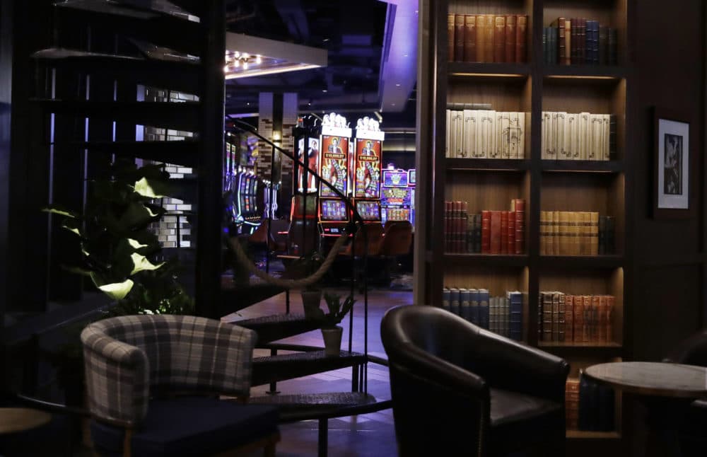 Guests can catch a peek of the casino floor through the hotel lobby. (Charles Krupa/AP)