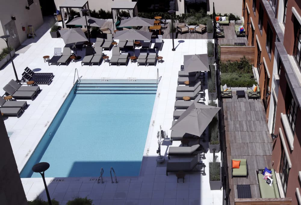 The casino features an outdoor pool deck with seating areas for guests to lounge. (Charles Krupa/AP)