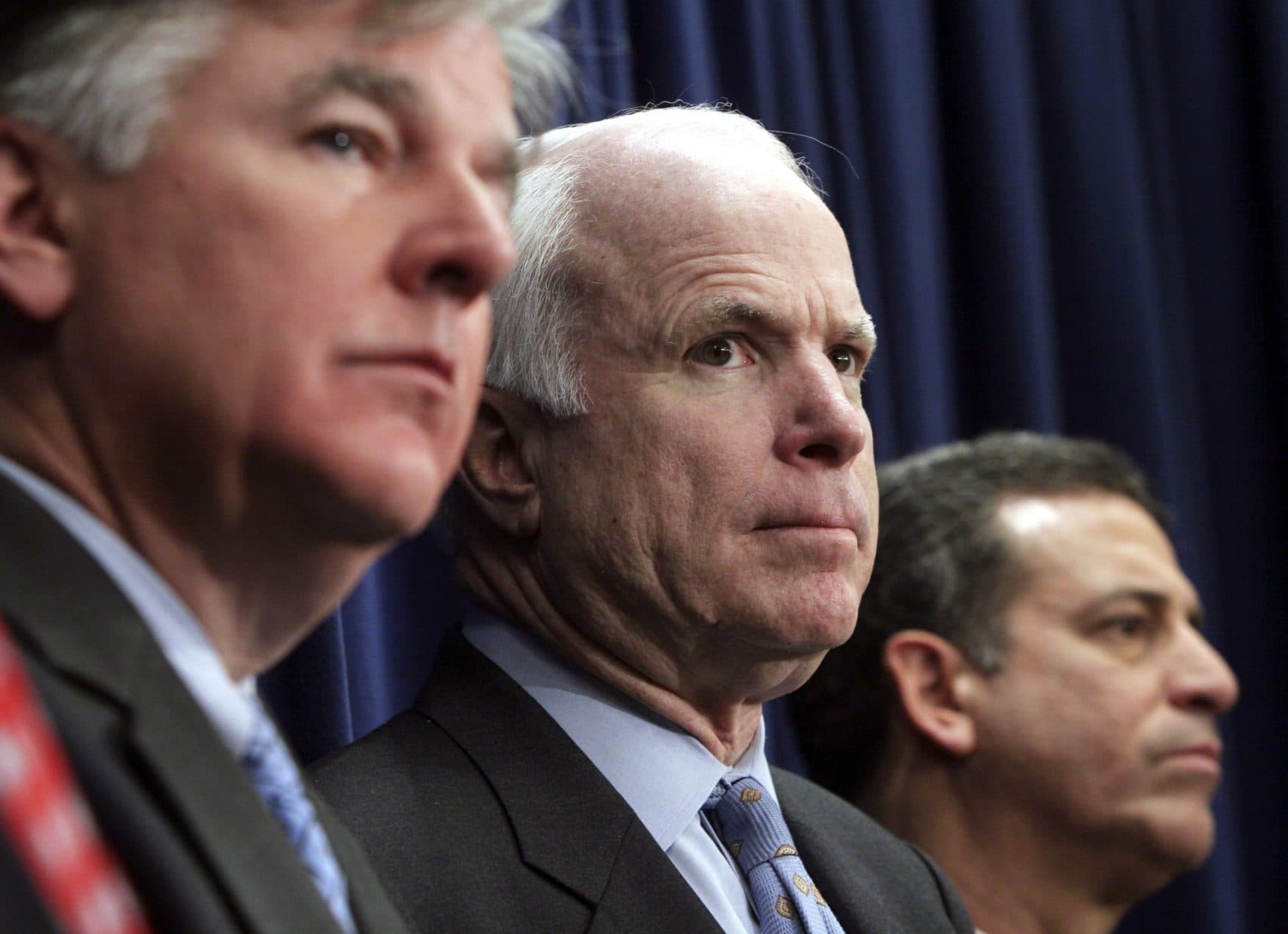 Sen. John McCain, (R-Ariz), Rep. Marty Meehan, (D-Mass.) (left) and Sen. Russell Feingold, (D-Wisc.) participate in a press conference on the importance of passing legislation on lobbying, ethics and earmark reform in the next Congress on Capitol Hill in Washington, D.C., Dec. 5, 2006. (Lauren Victoria Burke/Getty Images)
