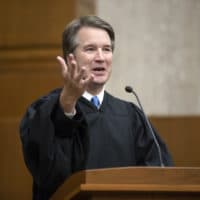 President Donald Trump's Supreme Court nominee, Judge Brett Kavanaugh, speaks as he officiates at the swearing-in of Judge Britt Grant to take a seat on the U.S. Court of Appeals for the Eleventh Circuit, Tuesday, Aug. 7, 2018, at the U.S. District Courthouse in Washington. (J. Scott Applewhite/AP)