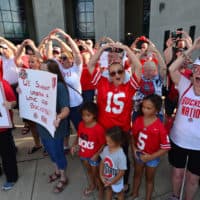Supporters of Ohio State head football coach Urban Meyer sing Carmen Ohio at an August 6th rally in Columbus, Ohio. (Jamie Sabau/Getty Images)