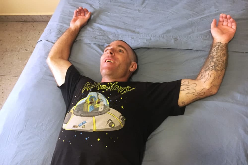 Dustin Dextraze is tripping on 5-MEO DMT given to him as part of his opioid addiction treatment at the ibogaine clinic in Mexico. (Deborah Becker/WBUR)