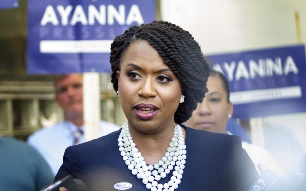 Ayanna Pressley talks with reporters outside the Adams Street Library in Dorchester