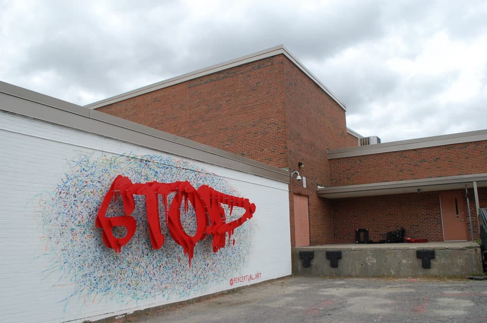 Artist Michael Murphy's mural in Worcester is a bit of an optical illusion. (Dana Forsythe for WBUR)