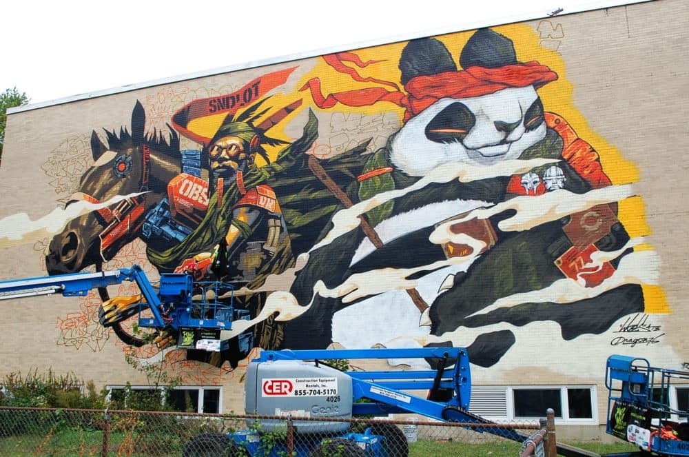 Dragon76 and Woes Martin's mural in Worcester. (Dana Forsythe for WBUR)
