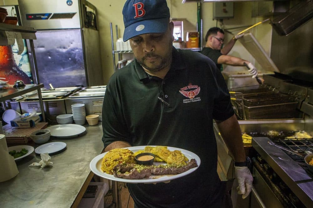 Cooked here by David Lebron, Cora's favorite dish at The Wings in his hometown of Caguas is skirt steak with rice and beans. (Jesse Costa/WBUR)