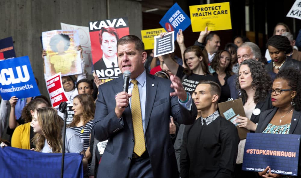 Boston Mayor Marty Walsh addresses the rally. (Robin Lubbock/WBUR)