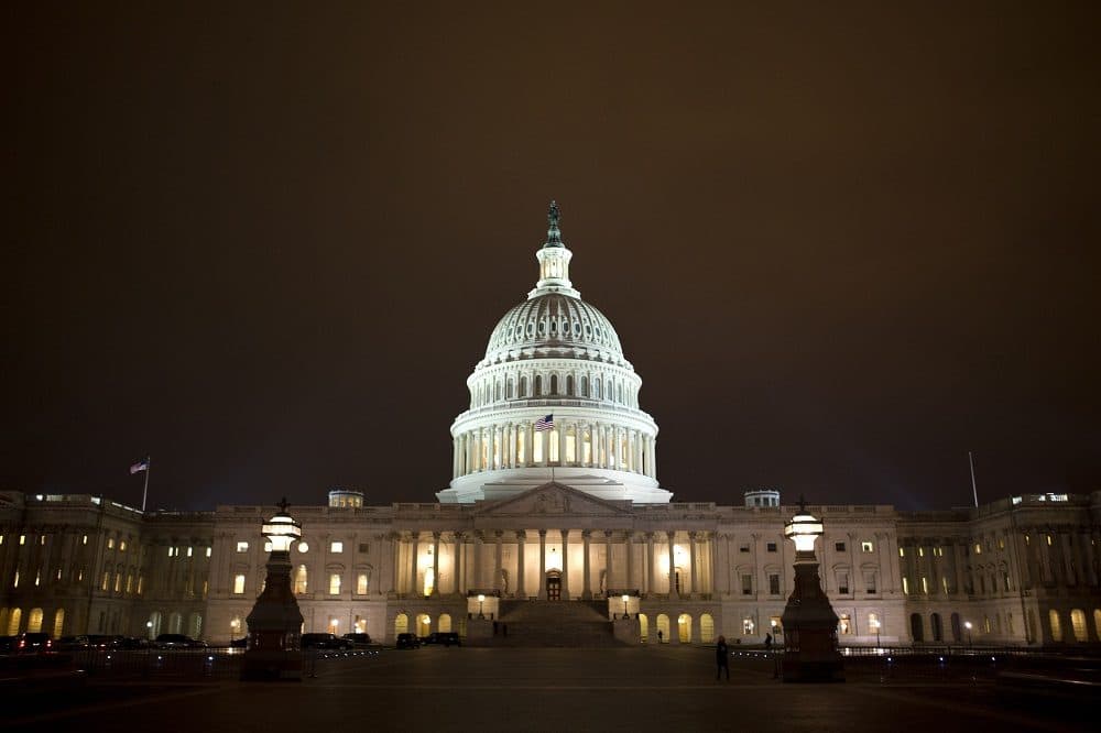 The lights of the U.S. Capitol remain lit into the night as the House continues to work on the "fiscal cliff" on Tuesday, Jan. 1, 2013. (AP/Jacquelyn Martin)
